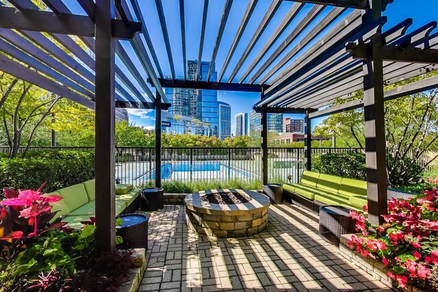400 N La Salle Dr Unit 1607, Chicago, IL 60654 - view of patio / terrace featuring a fire pit, a pergola, and a view of city