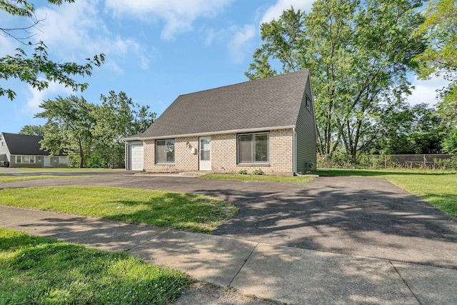 3701 176th St, Country Club Hills, IL 60478 - cape cod-style house with asphalt driveway, brick siding, a garage, and roof with shingles
