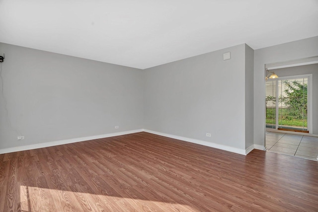 3701 176th St, Country Club Hills, IL 60478 - spare room with wood finished floors and baseboards
