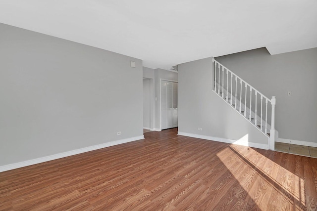 3701 176th St, Country Club Hills, IL 60478 - unfurnished living room with stairs and wood finished floors