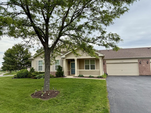16333 Crescent Lake Dr, Crest Hill, IL 60403 - ranch-style house featuring brick siding, an attached garage, asphalt driveway, a front lawn, and covered porch