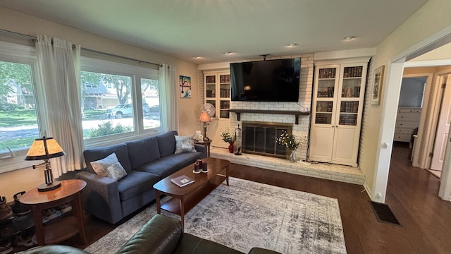 1317 N Mitchell Ave, Arlington Heights, IL 60004 - living area with a brick fireplace and wood finished floors