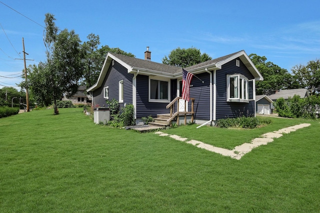 1452 Raymond St, South Elgin, IL 60177 - view of front of property with a front yard and a chimney