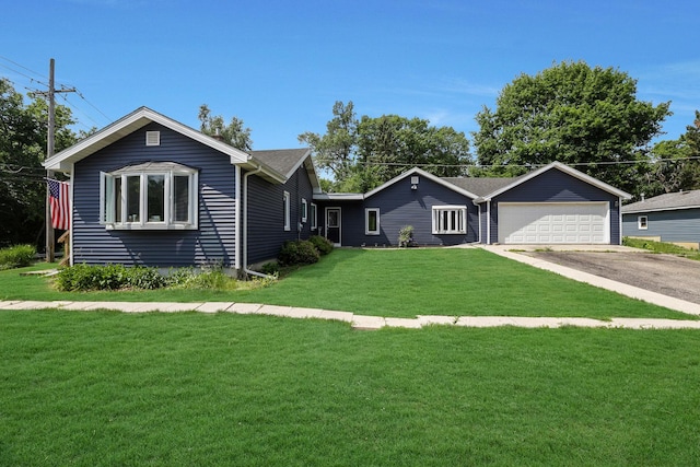 1452 Raymond St, South Elgin, IL 60177 - single story home featuring a front lawn and a garage