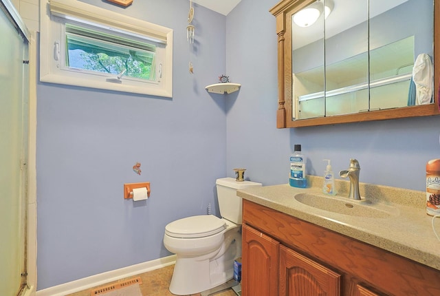1452 Raymond St, South Elgin, IL 60177 - full bathroom featuring a shower with door, vanity, and tile patterned floors