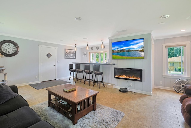 1452 Raymond St, South Elgin, IL 60177 - living room with crown molding, light tile patterned floors, a fireplace, and recessed lighting