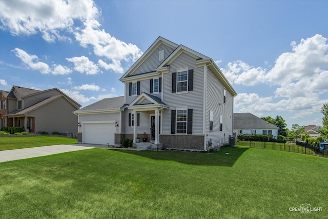 808 Karen Dr, Hampshire, IL 60140 - view of front of house with concrete driveway, an attached garage, and brick siding