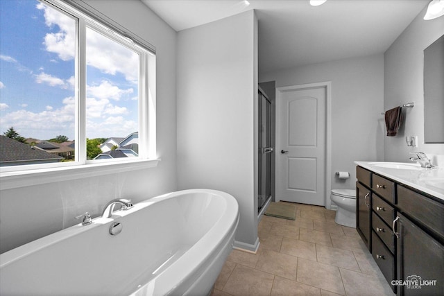 808 Karen Dr, Hampshire, IL 60140 - bathroom featuring vanity, a soaking tub, a shower stall, and tile patterned flooring