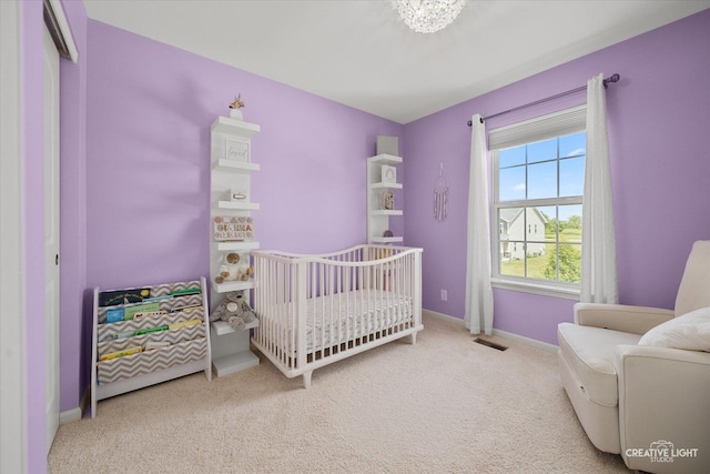 808 Karen Dr, Hampshire, IL 60140 - bedroom with carpet flooring and a crib