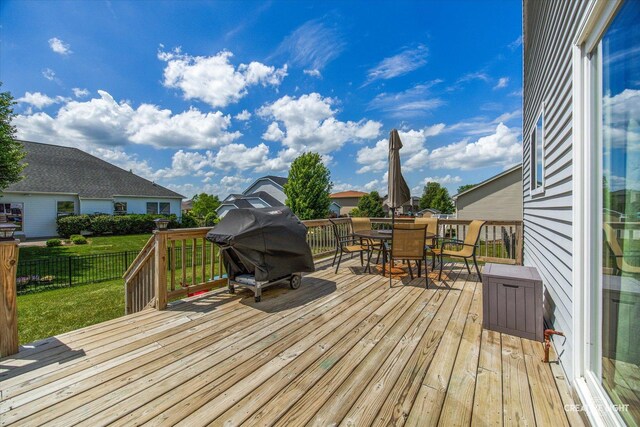 808 Karen Dr, Hampshire, IL 60140 - wooden terrace with outdoor dining area and a grill