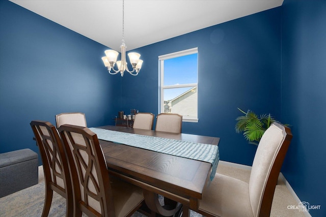 808 Karen Dr, Hampshire, IL 60140 - carpeted dining room featuring a chandelier and baseboards