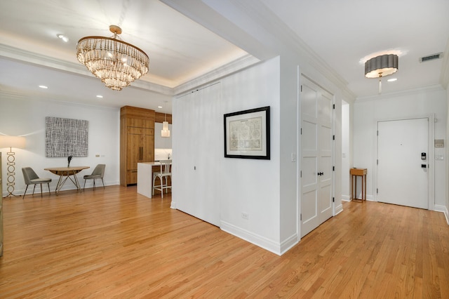 824 W Armitage Ave Unit 2Cd, Chicago, IL 60614 - foyer entrance featuring light wood-type flooring, crown molding, a chandelier, and recessed lighting