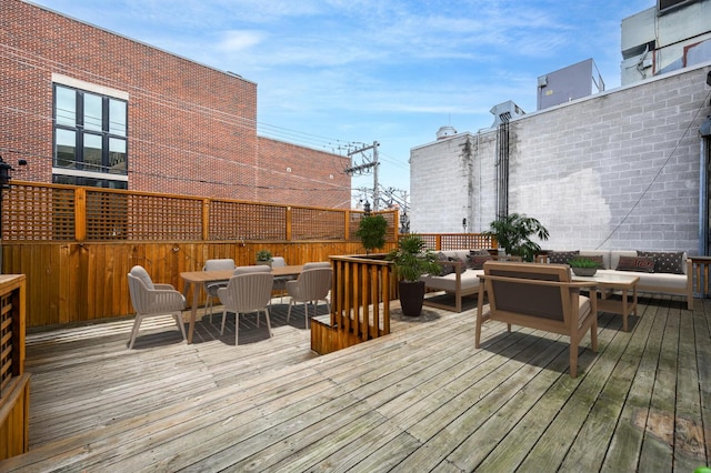 824 W Armitage Ave Unit 2Cd, Chicago, IL 60614 - wooden terrace with an outdoor hangout area and outdoor dining space