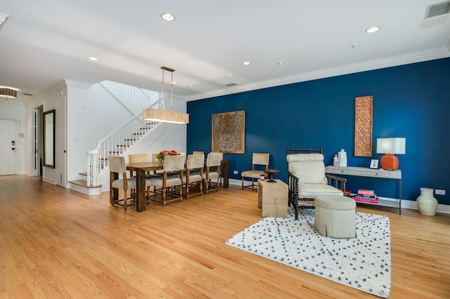 824 W Armitage Ave Unit 2Cd, Chicago, IL 60614 - living room with ornamental molding, stairs, wood finished floors, and recessed lighting