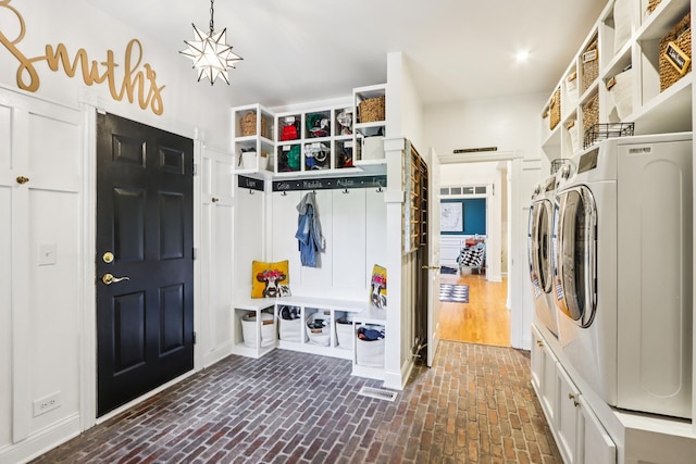 51 Mitchell Cir, Wheaton, IL 60189 - mudroom featuring washer and clothes dryer and brick flooring