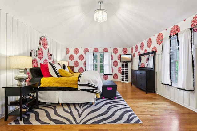 51 Mitchell Cir, Wheaton, IL 60189 - bedroom with wallpapered walls, wood finished floors, and a chandelier