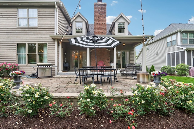 51 Mitchell Cir, Wheaton, IL 60189 - rear view of house featuring a patio area and a chimney