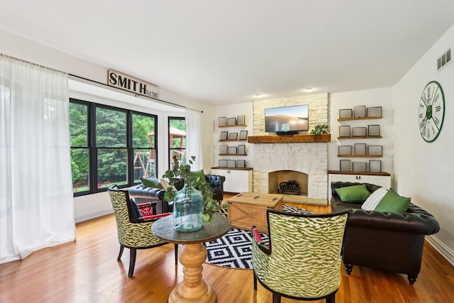 51 Mitchell Cir, Wheaton, IL 60189 - living room with wood finished floors and a stone fireplace