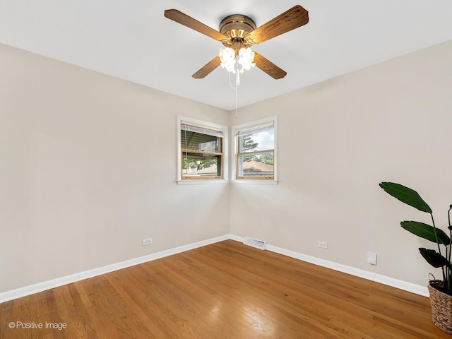 4220 Maple Ave, Brookfield, IL 60513 - spare room with wood finished floors and a ceiling fan