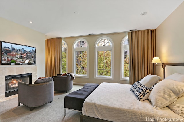 358 W Huron St Unit B, Chicago, IL 60654 - bedroom with carpet, a tile fireplace, and recessed lighting