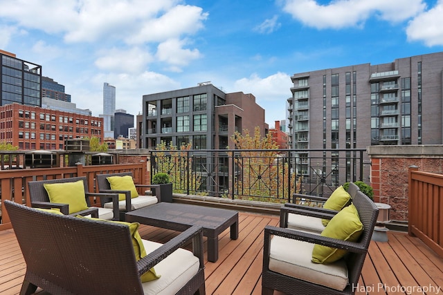 358 W Huron St Unit B, Chicago, IL 60654 - wooden deck featuring an outdoor living space and a view of city