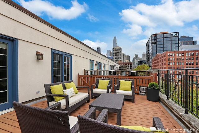 358 W Huron St Unit B, Chicago, IL 60654 - wooden terrace featuring an outdoor hangout area and a skyline view