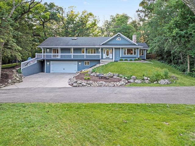 13302 Archer Ave, Lemont, IL 60439 - view of front facade featuring an attached garage, concrete driveway, covered porch, a chimney, and a front lawn