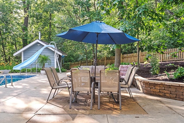 13302 Archer Ave, Lemont, IL 60439 - view of patio / terrace with outdoor dining space and an outdoor structure