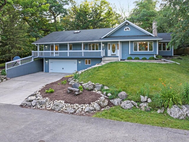 13302 Archer Ave, Lemont, IL 60439 - view of front of house featuring a garage, concrete driveway, a chimney, a porch, and roof with shingles
