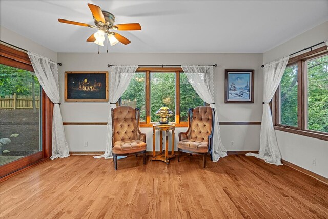 13302 Archer Ave, Lemont, IL 60439 - sitting room with light wood-style floors and ceiling fan