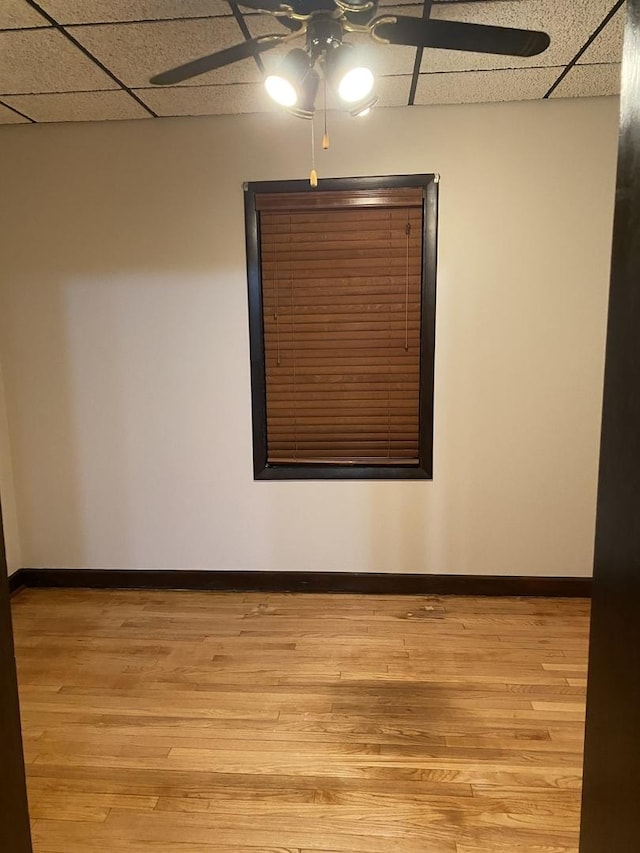 5015 S Talman Ave, Chicago, IL 60632 - unfurnished room featuring a ceiling fan, a paneled ceiling, and light wood-type flooring