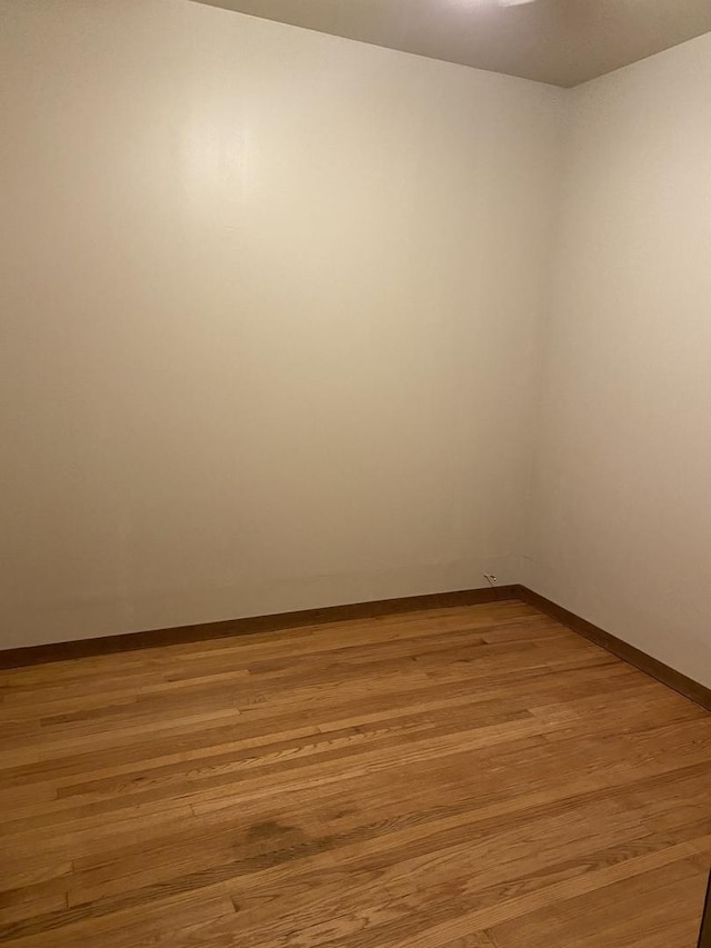 5015 S Talman Ave, Chicago, IL 60632 - unfurnished room with light wood-type flooring and baseboards