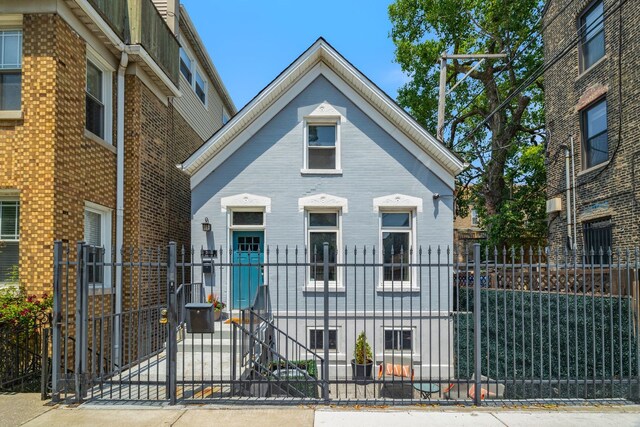 2012 W Charleston St, Chicago, IL 60647 - view of front of house with a fenced front yard and a gate