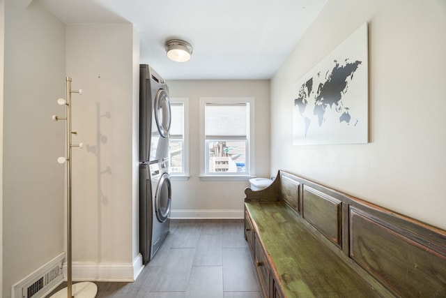 2012 W Charleston St, Chicago, IL 60647 - washroom with stacked washer / drying machine and baseboards
