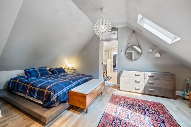 2012 W Charleston St, Chicago, IL 60647 - bedroom with a skylight, vaulted ceiling, light wood finished floors, and a chandelier