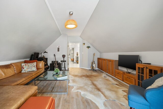 2012 W Charleston St, Chicago, IL 60647 - living room featuring light wood-type flooring and vaulted ceiling