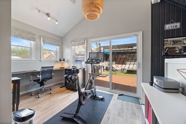 2012 W Charleston St, Chicago, IL 60647 - workout area with wood finished floors, high vaulted ceiling, and track lighting