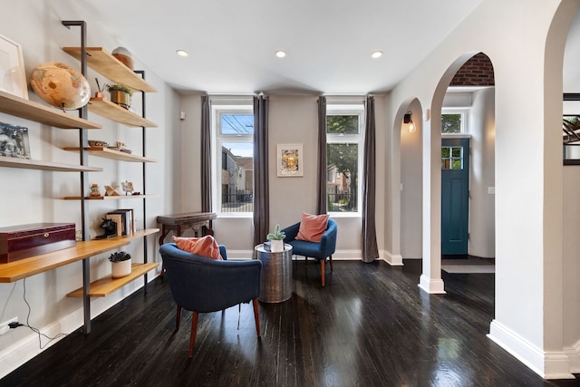 2012 W Charleston St, Chicago, IL 60647 - living area with arched walkways, wood finished floors, and recessed lighting