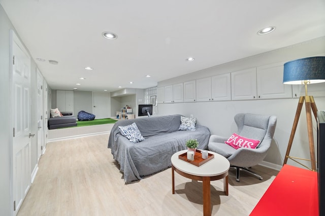 2012 W Charleston St, Chicago, IL 60647 - living room with light wood-style floors and recessed lighting