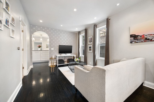 2012 W Charleston St, Chicago, IL 60647 - living area with wallpapered walls, wood-type flooring, recessed lighting, and arched walkways