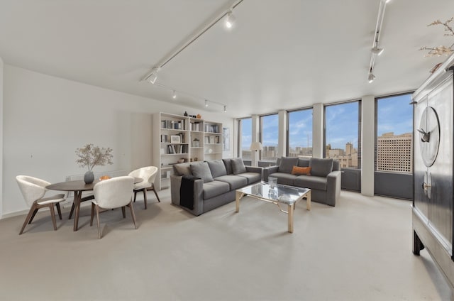 100 E Walton St Unit 40A, Chicago, IL 60611 - living area featuring track lighting and carpet