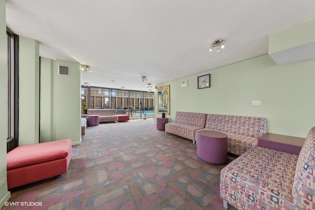 100 E Walton St Unit 40A, Chicago, IL 60611 - carpeted living area featuring expansive windows