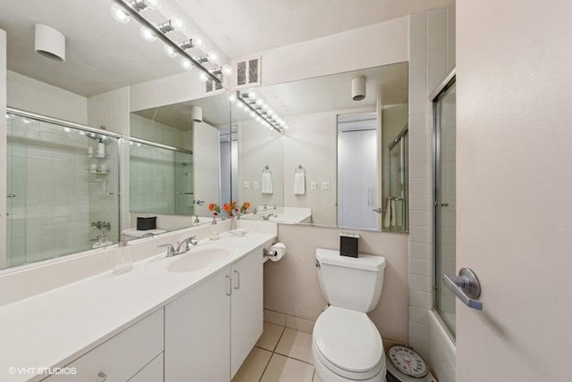 100 E Walton St Unit 40A, Chicago, IL 60611 - bathroom featuring tile patterned floors, vanity, and enclosed tub / shower combo