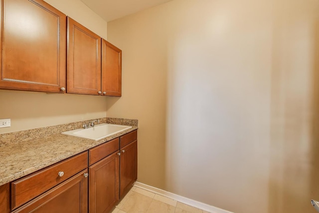520 S State St Unit 1726, Chicago, IL 60605 - laundry area with a sink and light tile patterned flooring