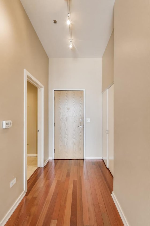 520 S State St Unit 1726, Chicago, IL 60605 - unfurnished room featuring hardwood / wood-style flooring and rail lighting