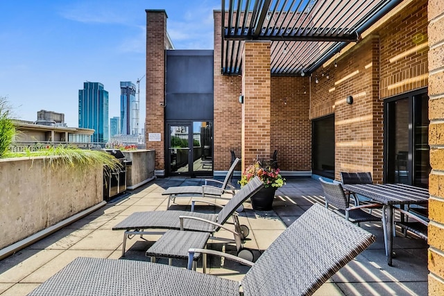 520 S State St Unit 1726, Chicago, IL 60605 - view of patio with outdoor dining space and a view of skyline