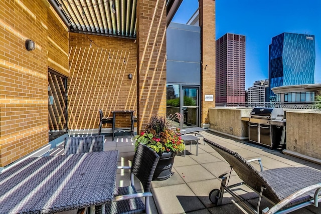 520 S State St Unit 1726, Chicago, IL 60605 - view of patio featuring an outdoor kitchen and a view of city