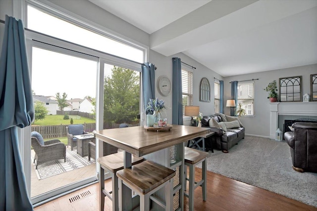 1854 Westridge Pl, Aurora, IL 60504 - dining space with a tiled fireplace and wood finished floors