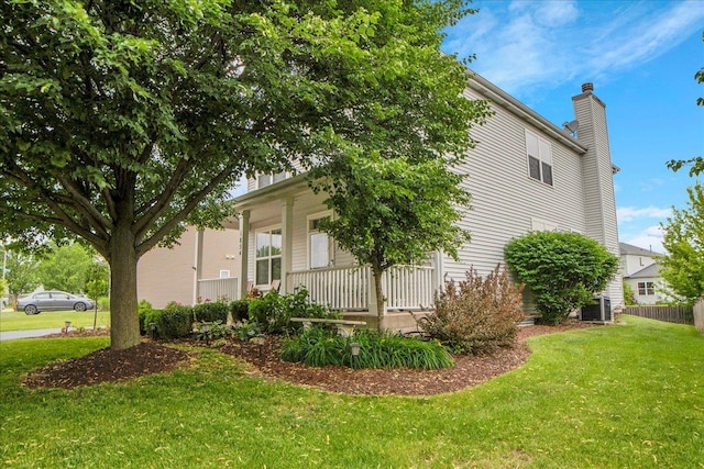 1854 Westridge Pl, Aurora, IL 60504 - view of property exterior featuring a chimney and covered porch