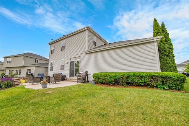 1854 Westridge Pl, Aurora, IL 60504 - rear view of house featuring a lawn and a patio area